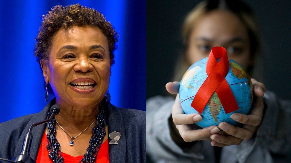 Representative Barbara Lee Aids red ribbon and globe in womans hands for World AIDS Day